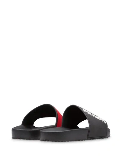 Shop Prada Logo Embossed Flat Slides - Black