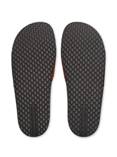 Shop Prada Logo Embossed Flat Slides - Black