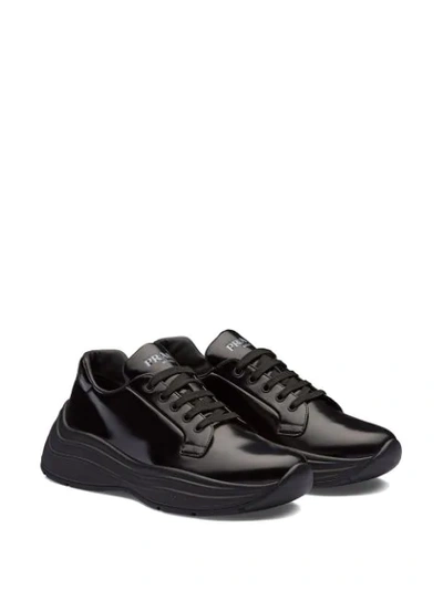 Shop Prada Chunky Lace-up Sneakers - Black