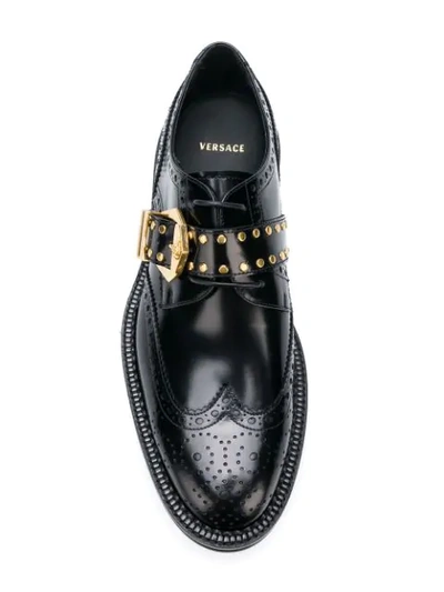 Shop Versace Buckled Oxford Shoes In Black