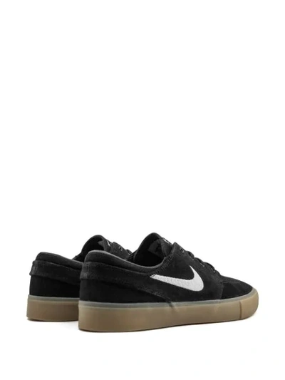 Shop Nike Sb Zoom Janoski Rm Sneakers In Black