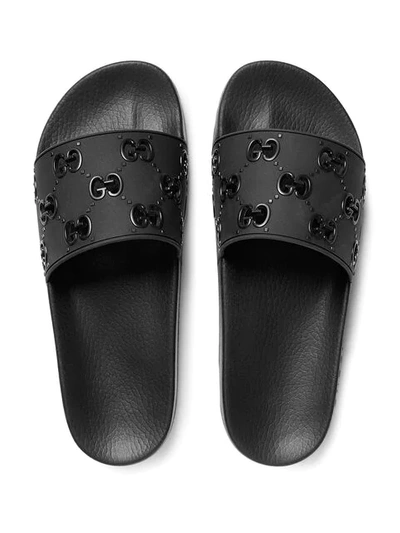 Shop Gucci Rubber Gg Slide Sandal In Black