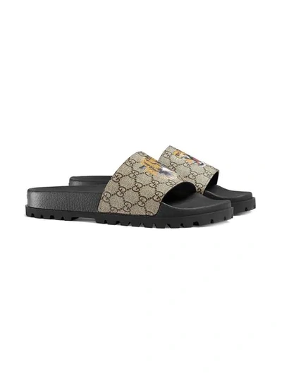 Shop Gucci Gg Supreme Tiger Slide Sandal In Brown