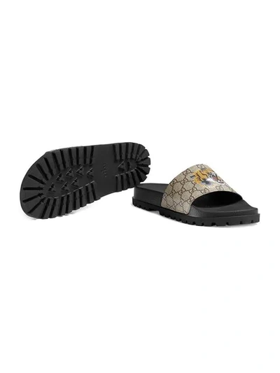 Shop Gucci Gg Supreme Tiger Slide Sandal In Brown