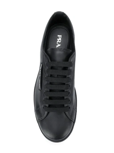 Shop Prada Low Top Logo Sneakers In Black