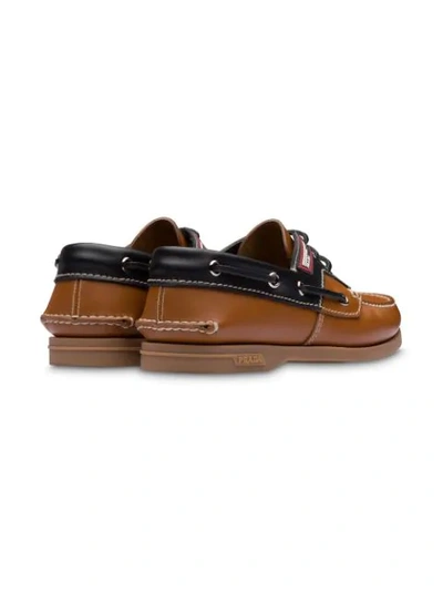 PRADA LACE-UP BOAT SHOES 