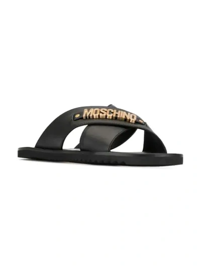 Shop Moschino Logo Plaque Sandals In Black