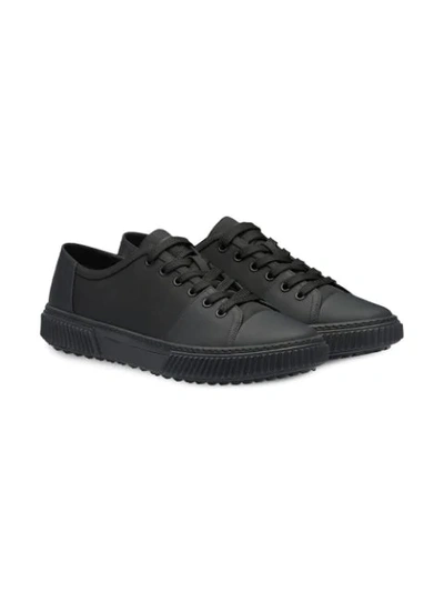 Shop Prada Leather Sneakers In Black