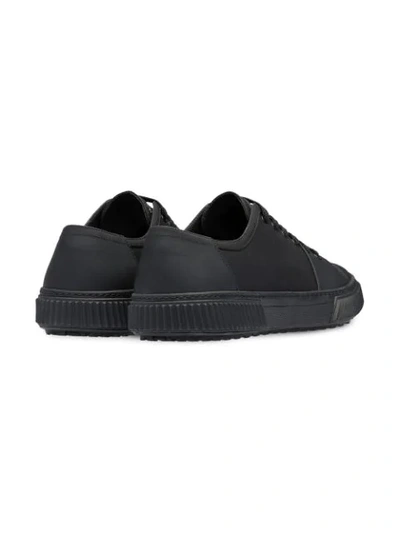 Shop Prada Leather Sneakers In Black