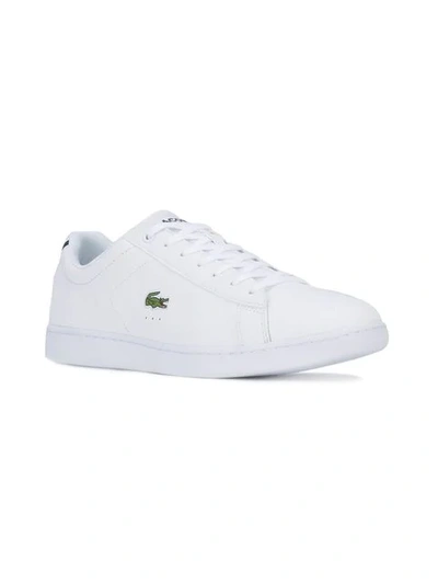 Shop Lacoste Lace Up Sneakers In White