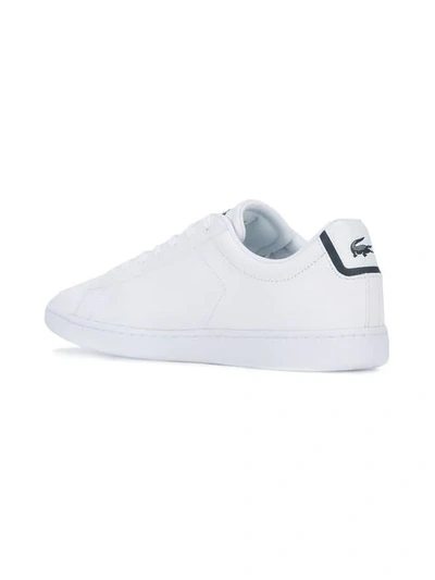 Shop Lacoste Lace Up Sneakers In White