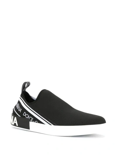 Shop Dolce & Gabbana Slip On Logo Sneakers In Black