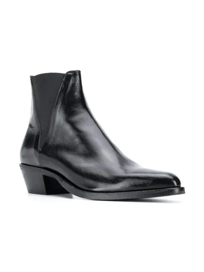 Shop Saint Laurent Dakota Chelsea Boots In Black