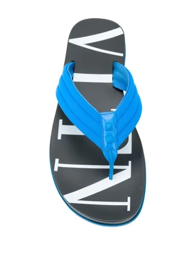 Shop Valentino Rockstud Vltn Thong Flip Flops In Blue