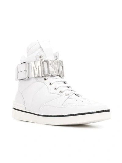 Shop Moschino Logo Plaque Hi-top Sneakers In White