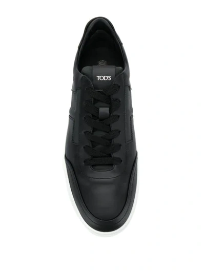 Shop Tod's Low Top Sneakers In Black