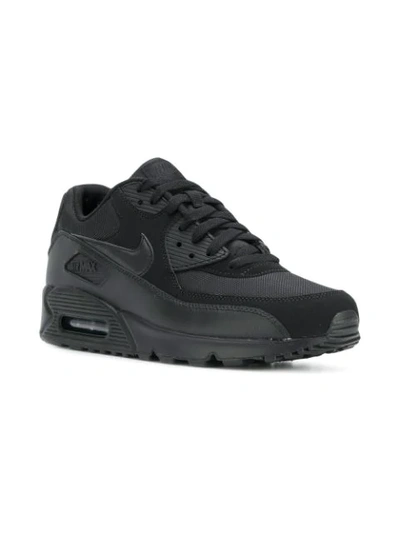 Shop Nike Air Max 90 Sneakers In Black