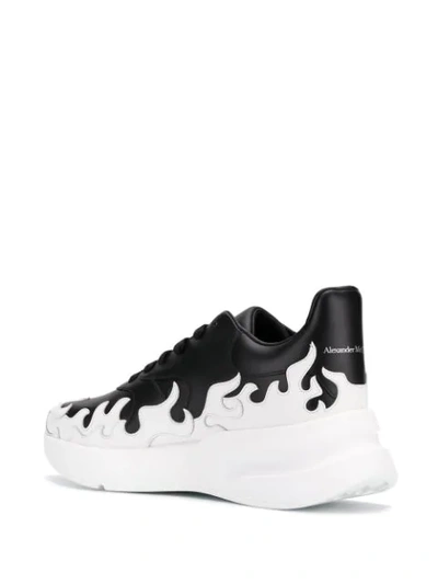 Shop Alexander Mcqueen Oversized Runner Flame Sneakers In 1006 Black/white