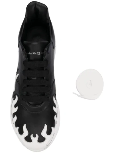 Shop Alexander Mcqueen Oversized Runner Flame Sneakers In 1006 Black/white