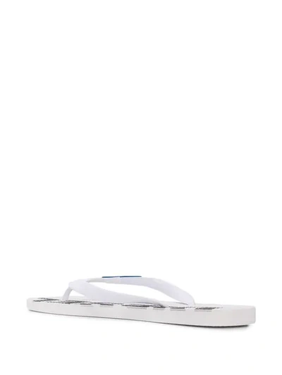 Shop Diesel Logo Flip Flops In White