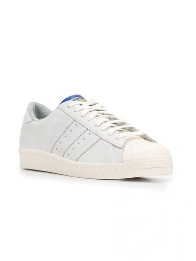 Shop Adidas Originals Superstar Sneakers In White