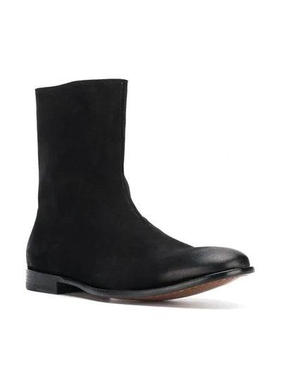 Shop Alexander Mcqueen Distressed Ankle Boots In Black