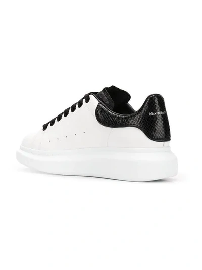 Shop Alexander Mcqueen Oversized Sole Sneakers In White ,black