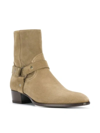 Shop Saint Laurent Wyatt 40 Harness Boots In Brown