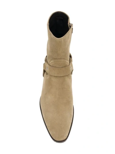 Shop Saint Laurent Wyatt 40 Harness Boots In Brown