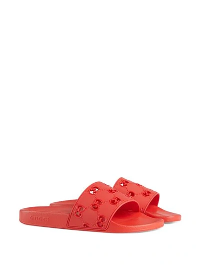 Shop Gucci Rubber Gg Slide Sandal In Red
