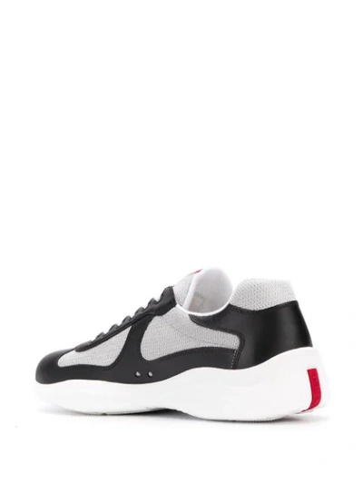 Shop Prada Panelled Low Top Sneakers In Black