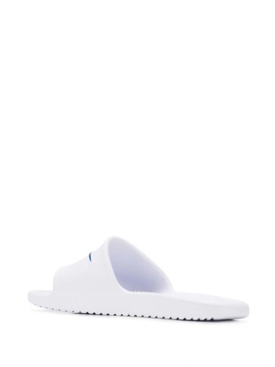 Shop Nike Kawa Shower Slides In White