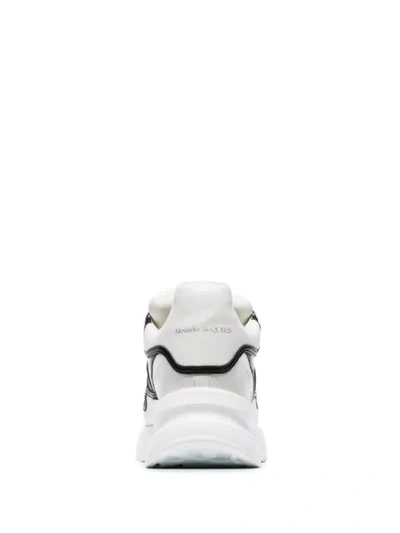Shop Alexander Mcqueen White And Black Runner Leather Sneakers