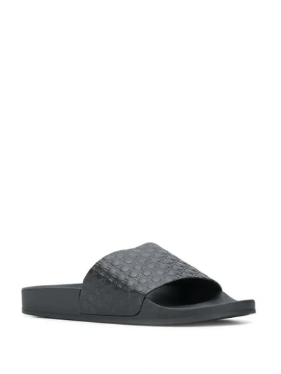 Shop Balmain Embossed Logo Squares Slides In Black