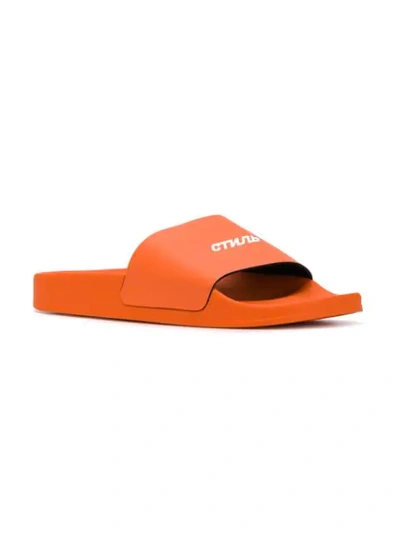 Shop Heron Preston Logo Sliders In Orange