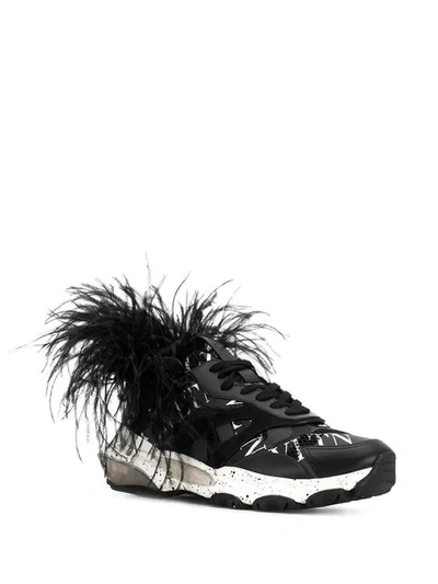 Valentino sneakers store with feathers