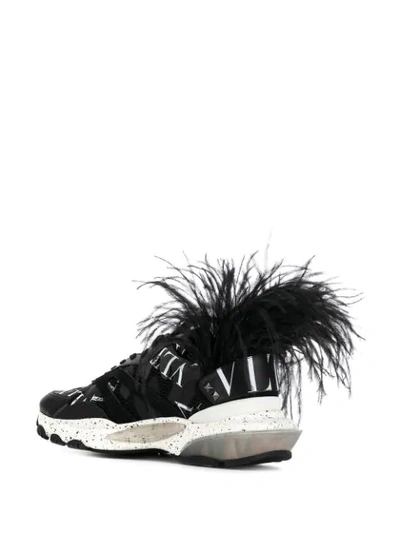 Shop Valentino Bounce Logo Grid Feather Sneakers In Black