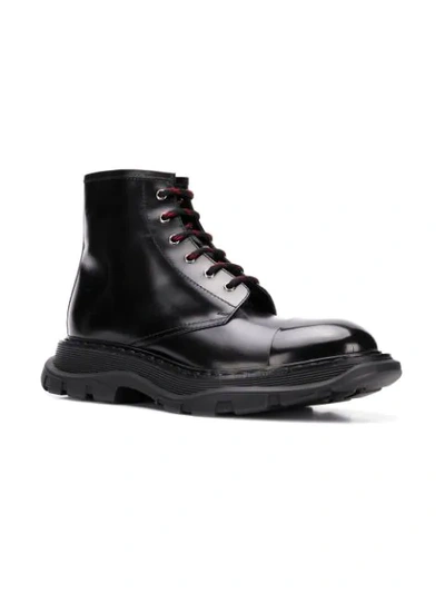 Shop Alexander Mcqueen Oversized Sole Combat Boots In Black