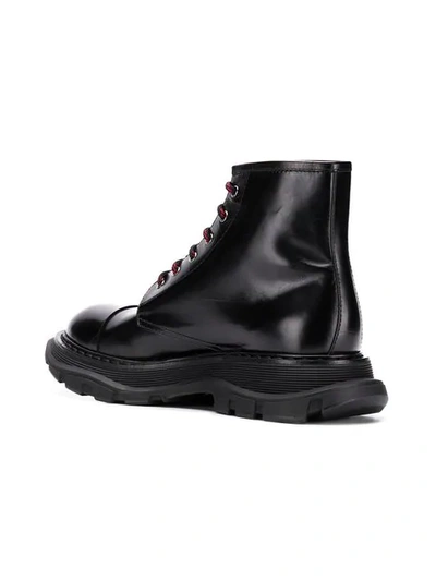 Shop Alexander Mcqueen Oversized Sole Combat Boots In Black