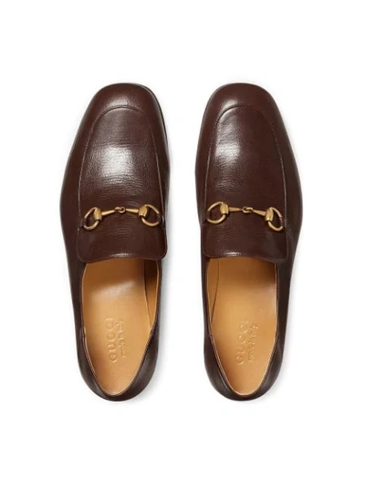 Shop Gucci Horsebit Leather Loafers In Brown