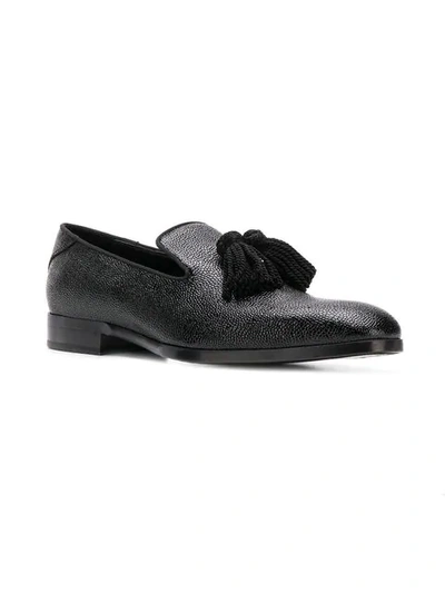 Shop Jimmy Choo Tassel Embellished Loafers In Black