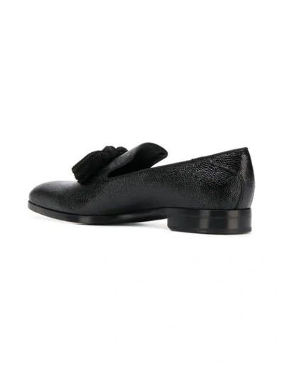 Shop Jimmy Choo Tassel Embellished Loafers In Black