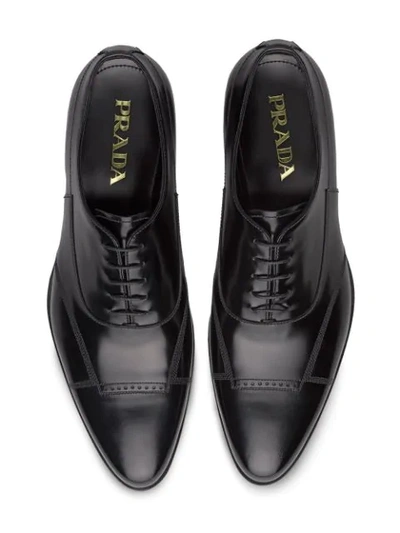 Shop Prada Brushed Oxford Shoes In Black