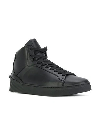Shop Versace Hi Top Sneakers In Black