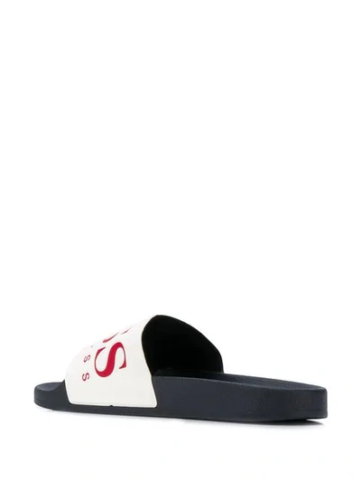 Shop Hugo Boss Embossed Logo Slides In Black