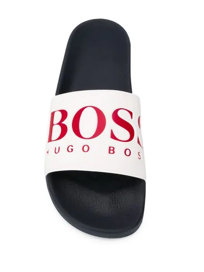 Shop Hugo Boss Embossed Logo Slides In Black