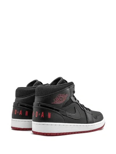 Shop Jordan Air  1 Mid In Black