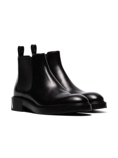 Shop Valentino Garavani Vltn Beatle Ankle Boots - Black
