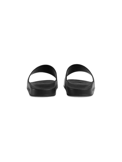 Shop Gucci Rubber Slide Sandals In Black
