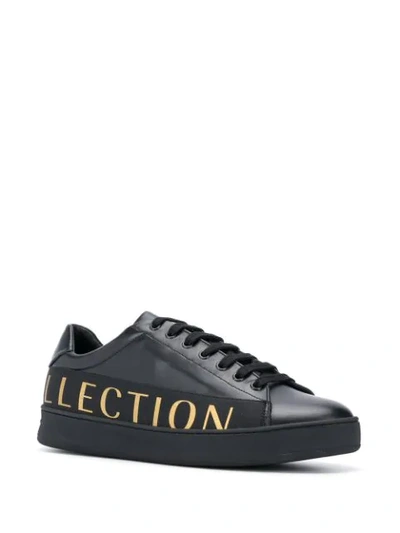 Shop Versace Logo Print Lace Up Sneakers In Black